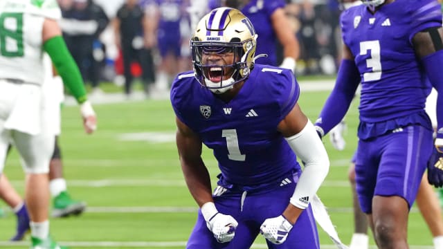 Dec 1, 2023; Las Vegas, NV, USA; Washington Huskies cornerback Jabbar Muhammad (1) celebrates after making a play against the Oregon Ducks during the second quarter at Allegiant Stadium. Mandatory Credit: Stephen R. Sylvanie-USA TODAY Sports